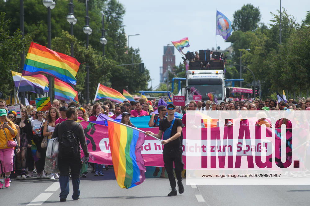 People march with pride flags and placards during the pride parade. Berlin Christopher Street Day (CSD Berlin) or Berlin Pride Parade is an annual demonstration in Berlin for the rights of LGBT+ people. Berlin Germany - ZUMAs197 20230722_zab_s197_071