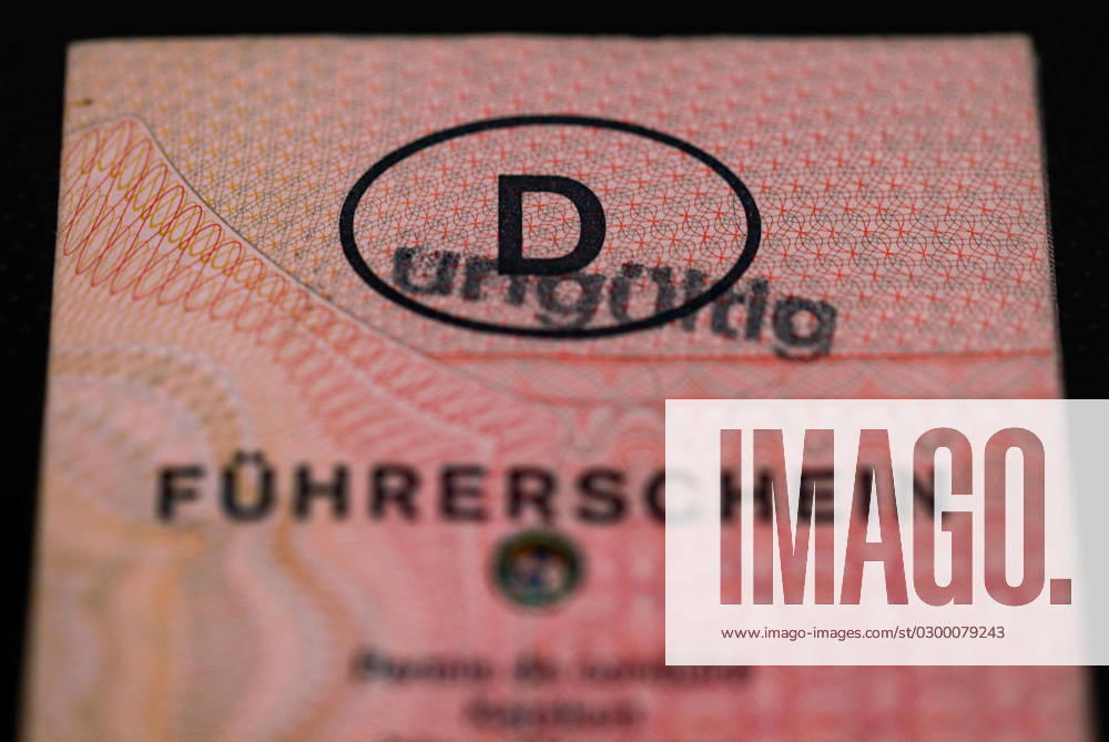 Frankenberg, Germany 02 April 2023 In the picture driving license invalid In the photo you can see a driving license marked with a stamp as invalid.