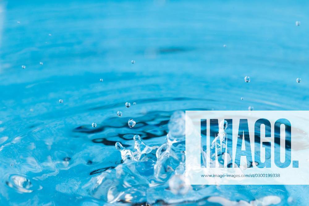 Close up of water drop falling into water with ripples and copy space on blue background Close up of water drop falling into water with ripples and copy space on blue background. Water, liquid and colour concept., model released, , property released, Cape Town, South Africa, 2023-06-07T22:00:00.000Z, 4132831.jpg, close,water drop,falling water,ripple,copy space,blue background,liquid,colour,concept,drop,splash,abstract,design,background,wet,flow,fluid,closeup,wave,illustration,macro,business,graphic,symbol,isolated,flowing,color,clean,drink,water,falling,copy,space,blue
