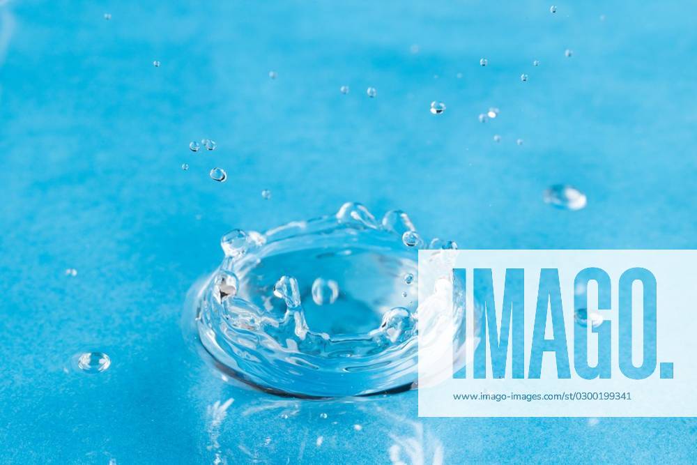 Close up of water drop falling into water with ripples and copy space on blue background Close up of water drop falling into water with ripples and copy space on blue background. Water, liquid and colour concept., model released, , property released, Cape Town, South Africa, 2023-06-07T22:00:00.000Z, 4132834.jpg, close,water drop,falling water,ripple,copy space,blue background,liquid,colour,concept,drop,splash,abstract,design,background,wet,flow,fluid,closeup,wave,illustration,macro,business,graphic,symbol,isolated,flowing,color,clean,drink,water,falling,copy,space,blue