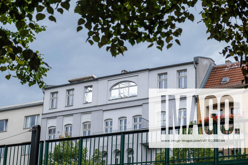 With silver foil taped window of a residential building on Schönhauser Allee in Berlin Prenzlauer Berg, should reduce the accumulating heat from solar radiation Fight the summer heat snph202307243461