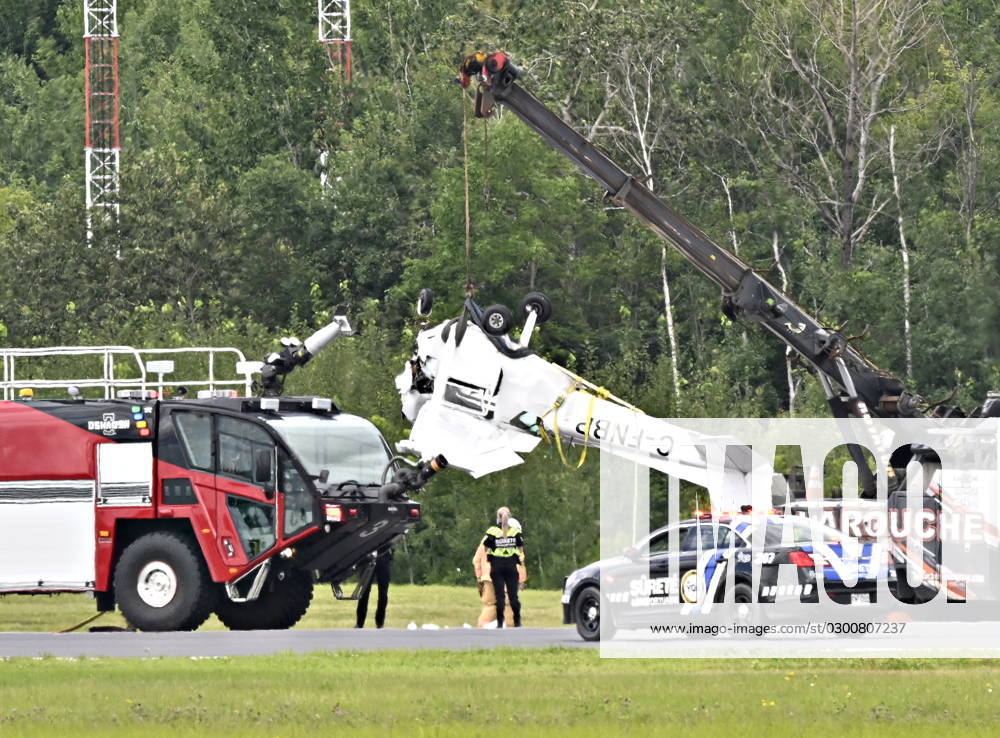 A Cessna 152 aircraft is towed away after it crashed on landing at the Jean-Lesage Airport in Quebec City, Tuesday, Aug. 1, 2023. One person was reported injured. QUEBEC Canada - ZUMAc35_ 20230801_zaf_c35_023