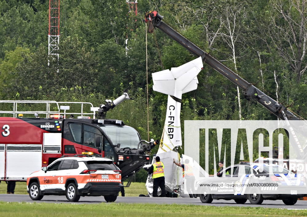 A Cessna 152 aircraft is towed away after it crashed on landing at the Jean-Lesage Airport Tuesday, Aug.1, 2023 in Quebec City. One person was reported injured. QUEBEC CITY Canada - ZUMAc35_ 20230801_zaf_c35_024