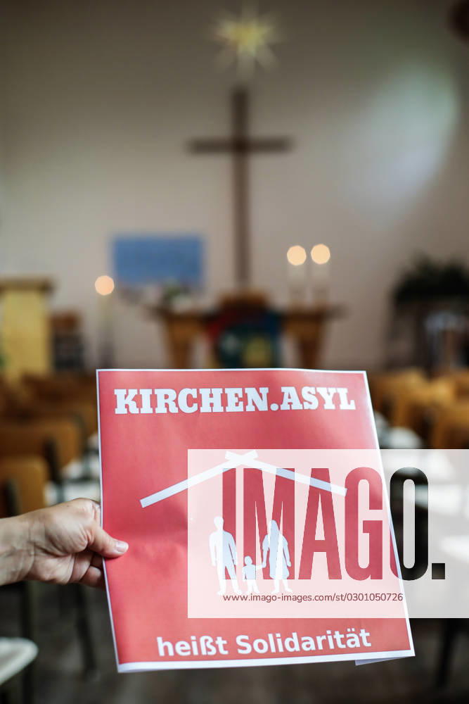 Sign saying church asylum means solidarity in a Protestant church Theme photo taken 03 08 2023