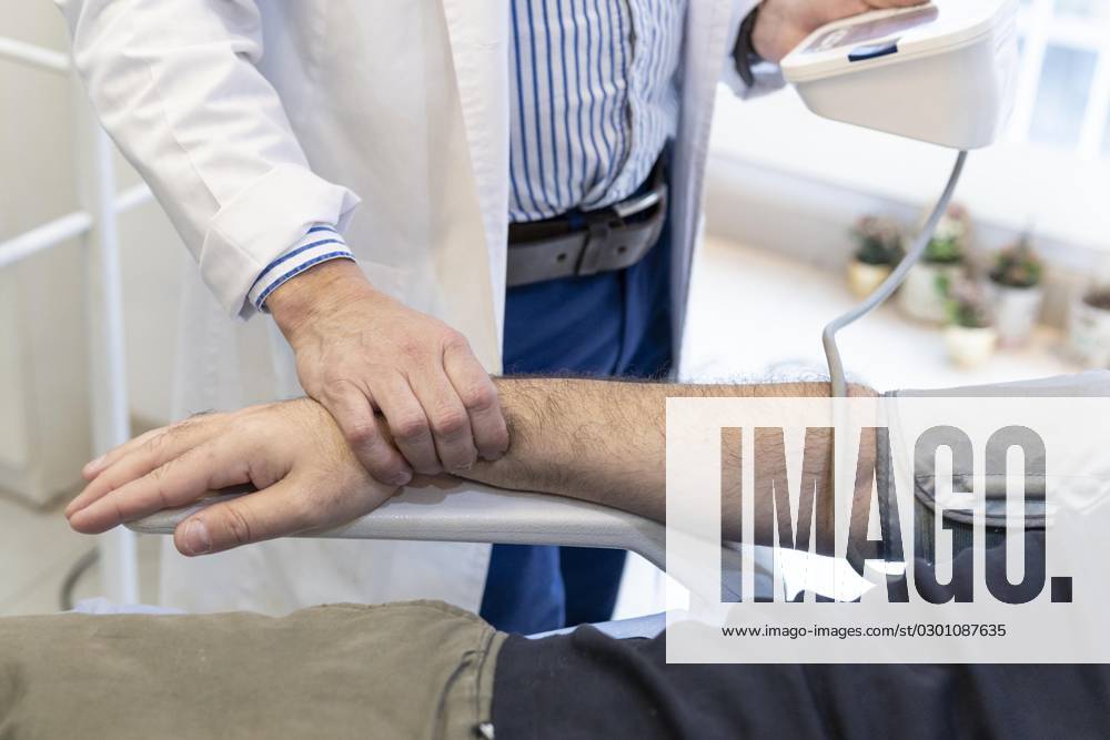 Doctor measures the Blood pressure of Patients