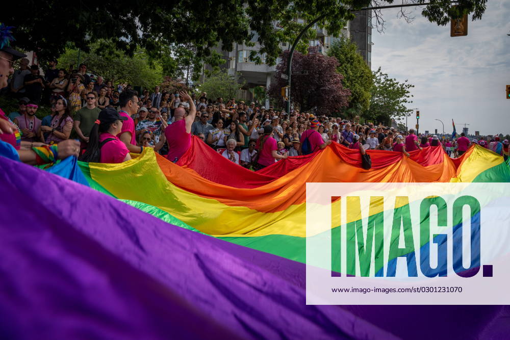 A large pride flag passes during the Pride Parade at English Bay in Vancouver, B.C., Sunday, Aug. 6, 2023. VANCOUVER CANADA - ZUMAc35_ 20230806_zaf_c35_017