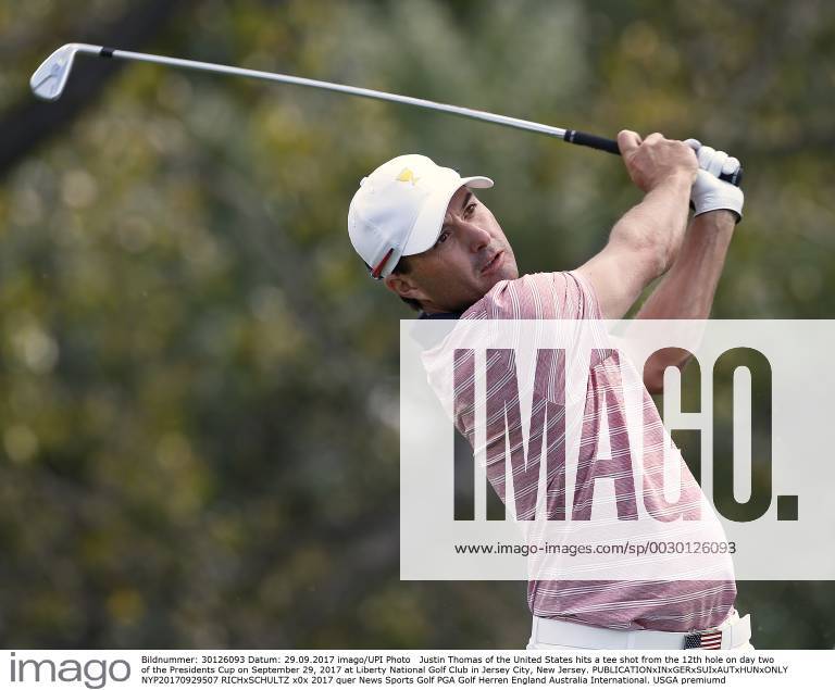 Justin Thomas of the United States hits a tee shot from the 12th hole on day two of the Presidents Cup on September 29, 2017 at Liberty National Golf Club in Jersey City, New Jersey. NYP20170929507 RICHxSCHULTZ