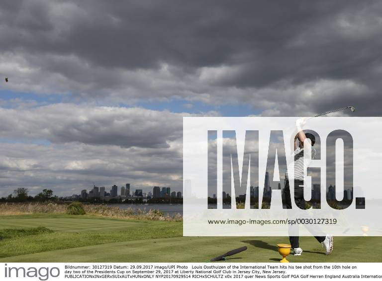 Louis Oosthuizen of the International Team hits his tee shot from the 10th hole on day two of the Presidents Cup on September 29, 2017 at Liberty National Golf Club in Jersey City, New Jersey. NYP20170929514 RICHxSCHULTZ