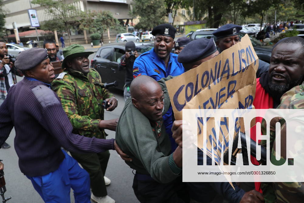 Police officers arrest an activist who was chanting slogans while holding a placard during a demonstration against the high cost of living within the Nairobi s capital. They are demanding the government to lower the prices of food and commodities. Nairobi Kenya - ZUMAs197 20230808_zaa_s197_033
