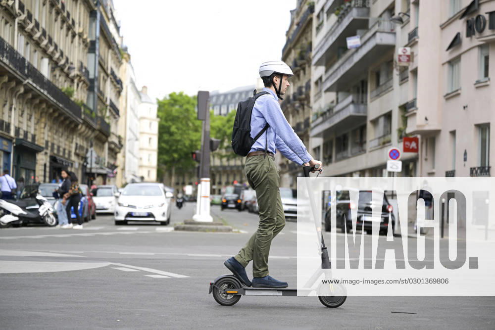 End Of Self-Service Scooters In Paris From September 1 Illustration picture shows people using a self-service electric scooter in streets of Paris, France on August 8, 2023. All self-service e-scooters will come to a stop in Paris as of 1 September after a referendum. Photo by Victor Joly ABACAPRESS.COM Paris France