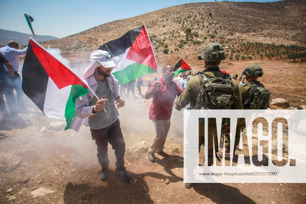 Israeli soldiers suppress Palestinian protesters with tear gas, during the demonstration against Israeli settlements in the village of Beit Dajan near the West Bank city of Nablus. Nablus Palestine - ZUMAs197 20230811_aaa_s197_148