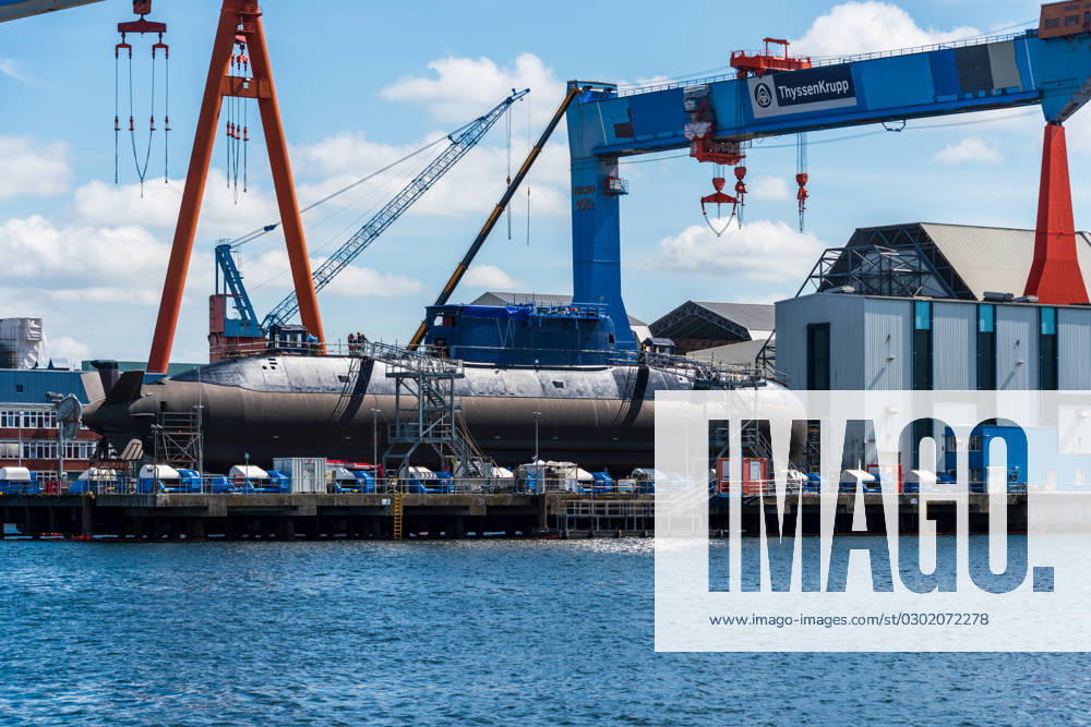 The ThyssenKrupp naval shipyard in Kiler harbor with one of the worlds most modern convetional submarines at the outfitting quay