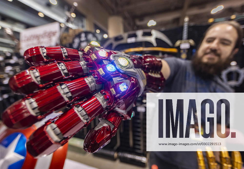 (230825) -- TORONTO, Aug. 25, 2023 -- An exhibitor shows an iron man infinity gauntlet during the 2023 Fan Expo Canada in Toronto, Canada, on Aug. 25, 2023. As one of the largest comics, sci-fi, anime and gaming events in Canada, the annual event is held here from Aug. 24 to Aug. 27, attracting hundreds of thousands of fans from across the world. (Photo by Xinhua) CANADA-TORONTO-FAN EXPO CANADA ZouxZheng