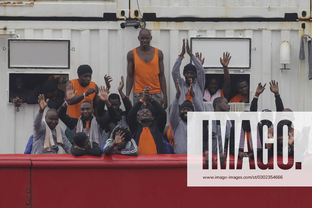 Migrants aboard the Ocean Viking , the SOS Mediterranee ship that rescued 439 migrants between Lampedusa and Tunisia, disembark in the port of Naples.