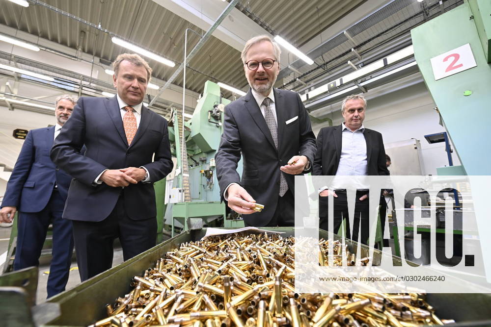 Czech Prime Minister Petr Fiala, 2nd from right, during his visit at the Sellier & Bellot ammunition manufacturer in Vlasim, Benesov region, Czech Republic, August 31, 2023. At left is Sellier & Bellot CEO Radek Musil. At right is National Security Adviser to the Prime Minister Tomas Pojar. (CTKxPhoto LubosxPavlicek) CTKPhotoP2023083106328 CTKPhotoP2023083106328