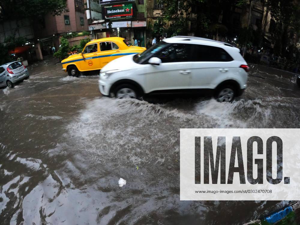 Monsoon Rain In Kolkata, India Commuters are wading through a flooded street during heavy rains in Kolkata, India, on Thursday, August 31, 2023. Kolkata India