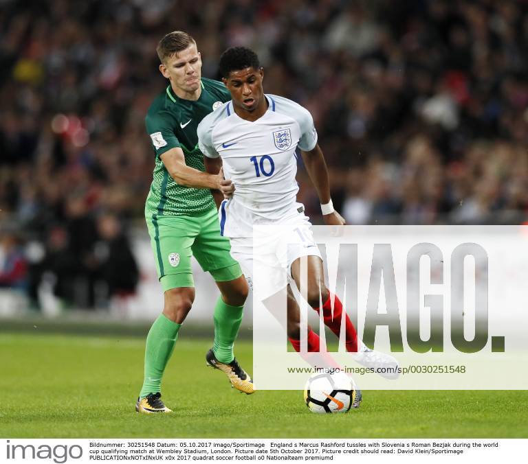 England s Marcus Rashford tussles with Slovenia s Roman Bezjak during the world cup qualifying match at Wembley Stadium, London. Picture date 5th October 2017. Picture credit should read: David Klein Sportimage .