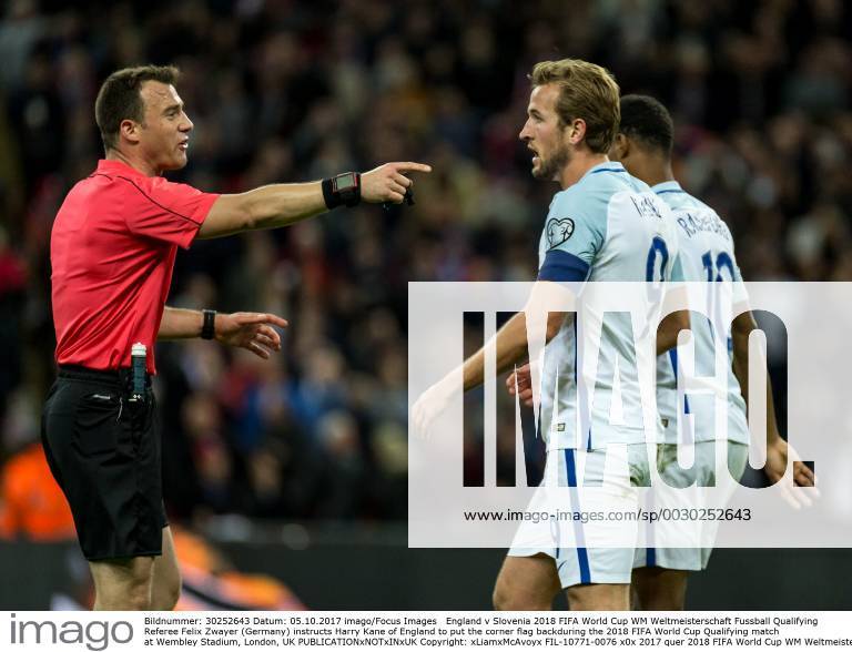 England v Slovenia 2018 FIFA World Cup WM Weltmeisterschaft Fussball Qualifying Referee Felix Zwayer (Germany) instructs Harry Kane of England to put the corner flag backduring the 2018 FIFA World Cup Qualifying match at Wembley Stadium, London, UK Content Not Available For UK Newspapers
