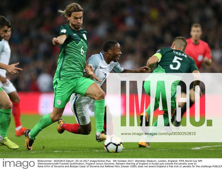 5th October 2017, Wembley Stadium, London, England; FIFA World Cup WM Weltmeisterschaft Fussball Qualification, England versus Slovenia; Raheem Sterling of England is fouled just outside the penalty area by Rene Krhin of Slovenia and Bostjan Cesar of Slovenia but Referee Felix Zwayer (GER) does not award England a free kick or penalty for the challenge ActionPlus11937880