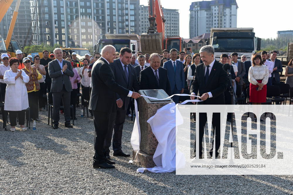 KYRGYZSTAN, BISHKEK - SEPTEMBER 1, 2023: Russia s Ambassador to Kyrgyzstan Nikolai Udovichenko, Russia s Deputy Education Minister Denis Gribov, Bishkek Mayor Emilbek Abdukadyrov and Kyrgyzstan s First Deputy Prime Minister Adylbek Kasymaliyev (L-R) attend the groundbreaking ceremony for a Russian language school (where subjects will be taught in Russian). The presidents of Kyrgyzstan and Russia joined the ceremony via videolink. Nogai Vladislav TASS 61604313