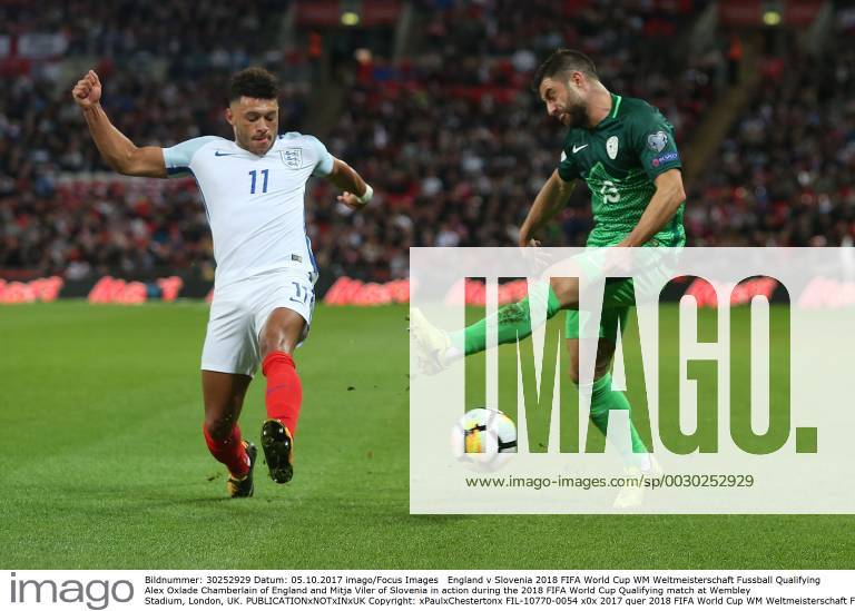 England v Slovenia 2018 FIFA World Cup WM Weltmeisterschaft Fussball Qualifying Alex Oxlade Chamberlain of England and Mitja Viler of Slovenia in action during the 2018 FIFA World Cup Qualifying match at Wembley Stadium, London, UK. Content Not Available For UK Newspapers