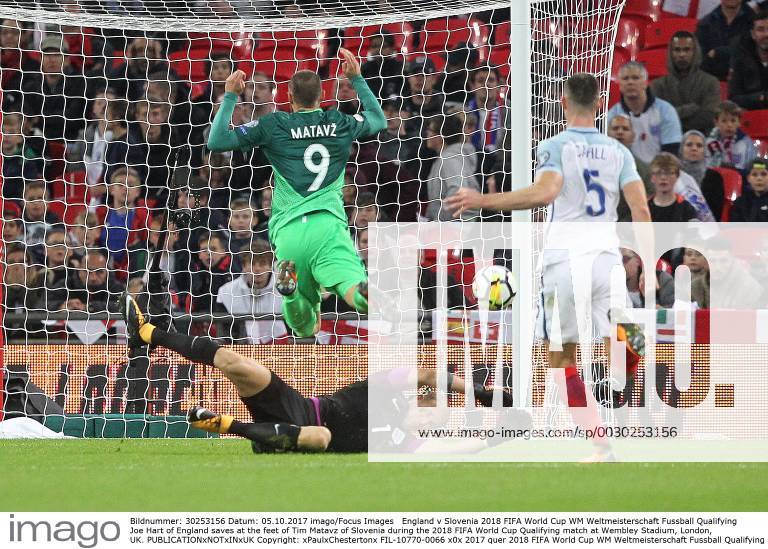 England v Slovenia 2018 FIFA World Cup WM Weltmeisterschaft Fussball Qualifying Joe Hart of England saves at the feet of Tim Matavz of Slovenia during the 2018 FIFA World Cup Qualifying match at Wembley Stadium, London, UK. Content Not Available For UK Newspapers
