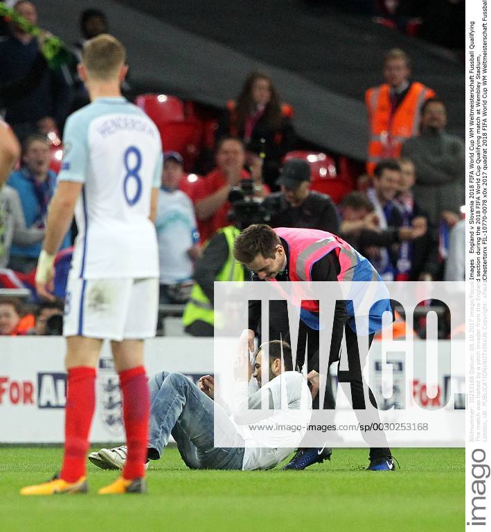 England v Slovenia 2018 FIFA World Cup WM Weltmeisterschaft Fussball Qualifying The match was halted by a pitch invader from the England section during the 2018 FIFA World Cup Qualifying match at Wembley Stadium, London, UK. Content Not Available For UK Newspapers