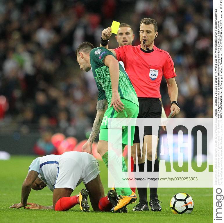England v Slovenia 2018 FIFA World Cup WM Weltmeisterschaft Fussball Qualifying Valter Birsa of Slovenia gets a yellow card from Referee Felix Zwayer for his foul on Raheem Sterling of England during the 2018 FIFA World Cup Qualifying match at Wembley Stadium, London, UK. Content Not Available For UK Newspapers