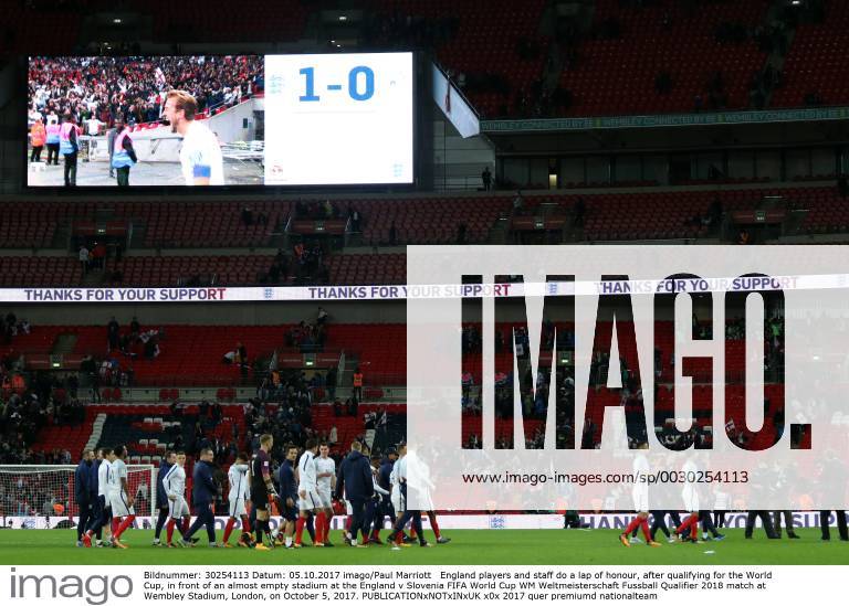 England players and staff do a lap of honour, after qualifying for the World Cup, in front of an almost empty stadium at the England v Slovenia FIFA World Cup WM Weltmeisterschaft Fussball Qualifier 2018 match at Wembley Stadium, London, on October 5, 2017.