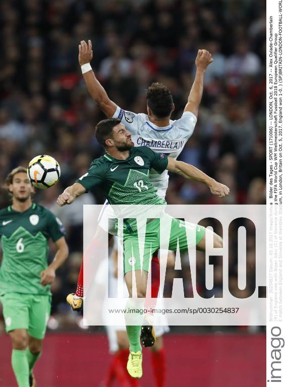 - SPORT (171006) -- LONDON, Oct. 6, 2017 -- Alex Oxlade-Chamberlain (R) of England vies with Bojan Jokic (C) of Slovenia during the FIFA World Cup WM Weltmeisterschaft Fussball 2018 European Qualifier Group E match between England and Slovenia at Wembley Stadium, in London, Britain on Oct. 5, 2017. England won 1-0. ) (SP)BRITAIN-LONDON-FOOTBALL-WORLD CUP QUALIFIER-ENGLAND VS SLOVENIA HanxYan
