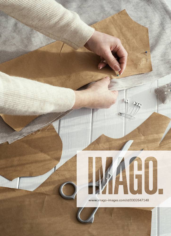 Upright seamstress with Fabric scissors