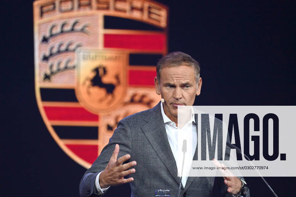 Oliver BLUME Chairman of the Executive Board of Dr Ing h c F Porsche AG and Volkswagen AG at a lecture on 05 09 2023 in front of Porsche logo,brand emblem IAA Mobility 2023 at Messe Riem from 05 09 10 09 2023 in Munich.