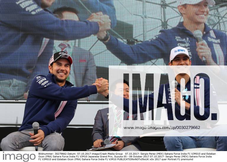 Sergio Perez (MEX) Sahara Force India F1 VJM010 and Esteban Ocon (FRA) Sahara Force India F1 VJM10 Japanese Grand Prix, Suzuka 05 - 08 October 2017 07.10.2017- Sergio Perez (MEX) Sahara Force India F1 VJM010 and Esteban Ocon (FRA) Sahara Force India F1 VJM10