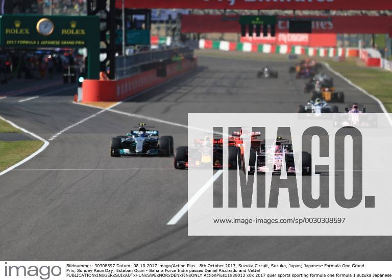 8th October 2017, Suzuka Circuit, Suzuka, Japan; Japanese Formula One Grand Prix, Sunday Race Day; Esteban Ocon - Sahara Force India passes Daniel Ricciardo and Vettel ActionPlus11939013