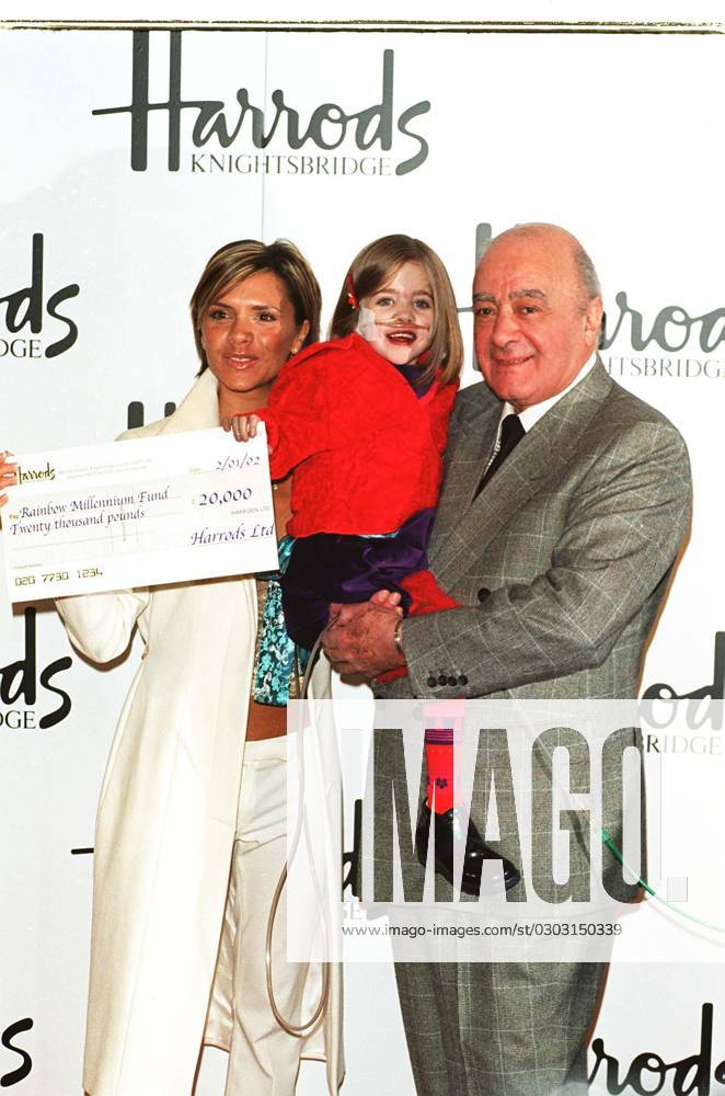 VICTORIA BECKHAM British Pop Singer with MOHAMED AL FAYED Chairman of Harrods At Harrods in London today where Victoria opened the doors at the start of the store s January sale. Seen here with KIRSTY HOWARD, who suffers from a rare heart condition an VICTORIA BECKHAM British Pop Singer with MOHAMED AL FAYED Chairman of Harrods At Harrods in London today where Victoria opened the doors at the start of the store s January sale. Seen here with KIRSTY HOWARD, who suffers from a rare heart condition and attended the event to receive a cheque for £20,000 on behalf of Francis House Hospice, which was donated by Harrods COMPULSORY CREDIT: Starstock Photoshot Photo UGL 018884 D-32 02.01.2002, Credit:Photoshot Avalon United Kingdom