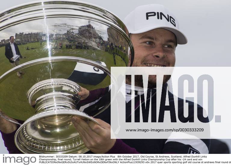 8th October 2017, Old Course, St Andrews, Scotland; Alfred Dunhill Links Championship, final round; Tyrrell Hatton on the 18th green with the Alfred Dunhill Links Championship Cup after his -24 card and win ActionPlus11939293
