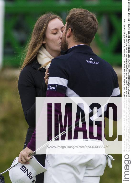 8th October 2017, Old Course, St Andrews, Scotland; Alfred Dunhill Links Championship, final round; Tyrrell Hatton Emily Breisher on the 18th green as she congratualates him on win and -24 card ActionPlus11939291