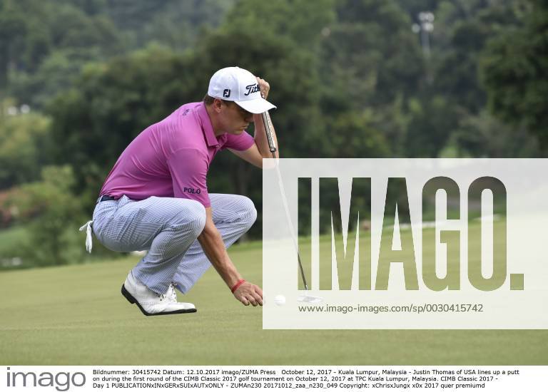 Kuala Lumpur, Malaysia - Justin Thomas of USA lines up a putt on during the first round of the CIMB Classic 2017 golf tournament on October 12, 2017 at TPC Kuala Lumpur, Malaysia. CIMB Classic 2017 - Day 1 - ZUMAn230 20171012_zaa_n230_049
