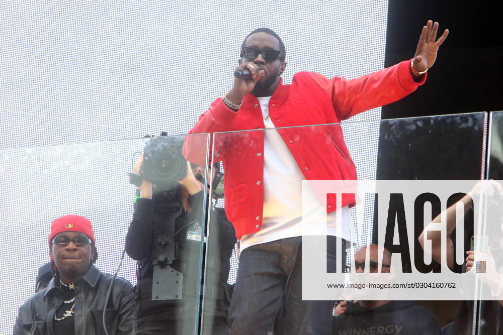 NEW YORK, NY - SEPTEMBER 15: Sean Diddy Combs is presented with the key to the city by New York Mayor Eric Adams in Times Square on September 15, 2023 in New York City.