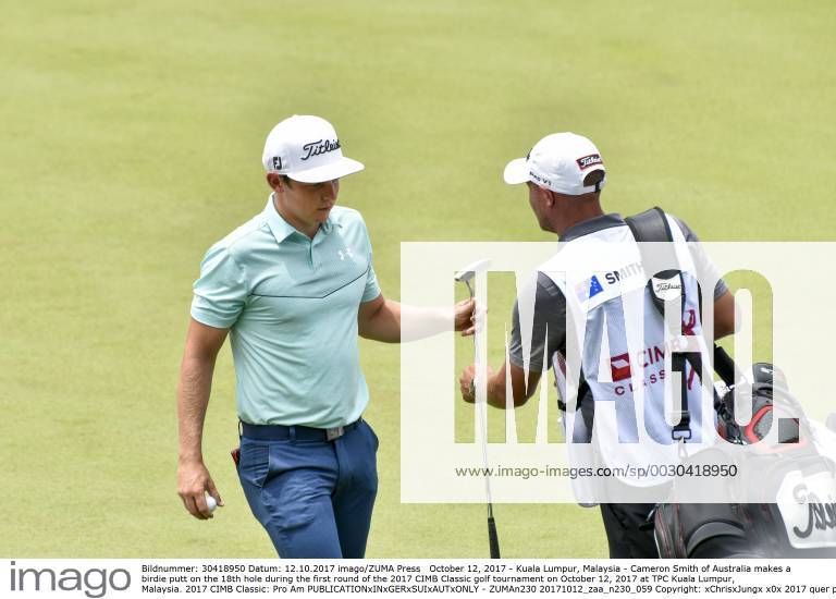 Kuala Lumpur, Malaysia - Cameron Smith of Australia makes a birdie putt on the 18th hole during the first round of the 2017 CIMB Classic golf tournament on October 12, 2017 at TPC Kuala Lumpur, Malaysia. 2017 CIMB Classic: Pro Am - ZUMAn230 20171012_zaa_n230_059
