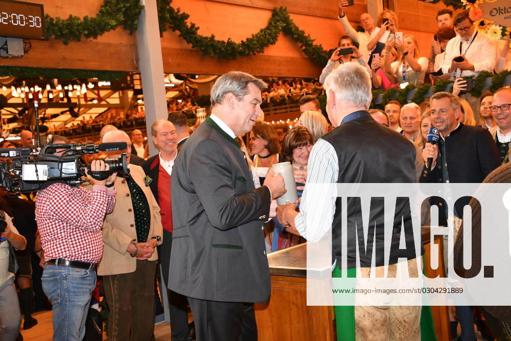 Markus Söder Prime Minister of Bavaria and Dieter Reiter Mayor of Munich Wiesn opening 2023 tapping Schottenhammel Theresienwiese Munich 16 September 2023