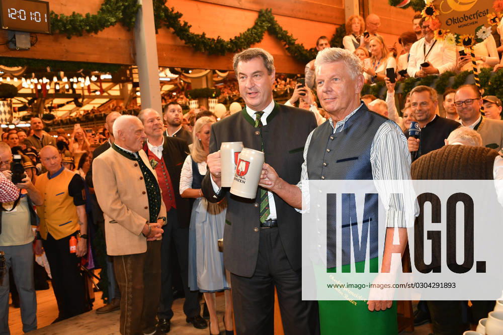Markus Söder Prime Minister of Bavaria and Dieter Reiter Mayor of Munich Wiesn opening 2023 tapping Schottenhammel Theresienwiese Munich 16 September 2023