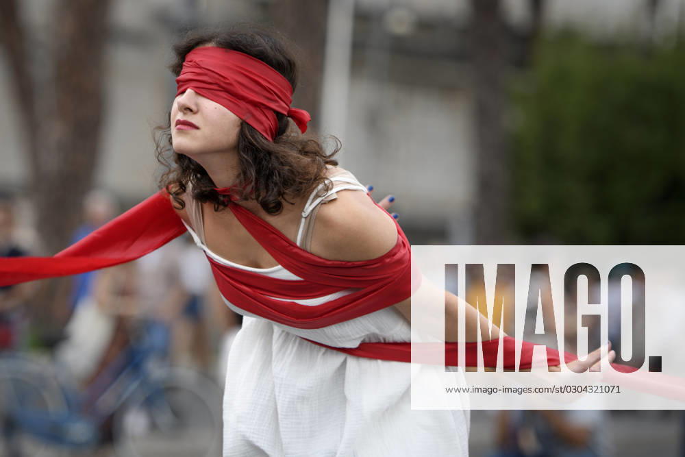 An Iranian woman blindfolded and with her arms tied with a blood red ribbon in representation of the state of women in Iran during the demonstration to commemorate the death of Mahsa Amini in Rome. Mahsa Amini, arrested in Tehran on 13 September 2022 by the religious police due to failure to comply with the law on compulsory veiling. She died under suspicious circumstances after three days in a coma on 16 September 2022 at the age of 22. Her death has become a symbol of women s status and violence against women under the Islamic Republic of Iran. Rome Italy - ZUMAv147 20230916_zip_v147_013