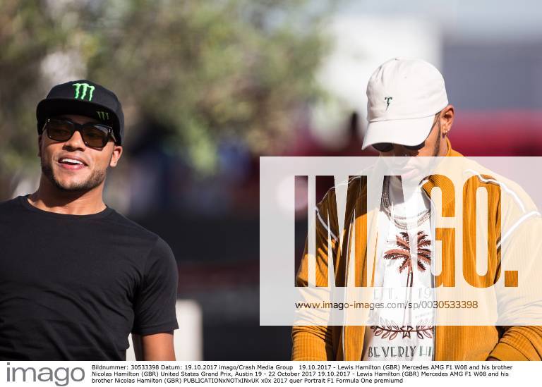 Lewis Hamilton (GBR) Mercedes AMG F1 W08 and his brother Nicolas Hamilton (GBR) United States Grand Prix, Austin 19 - 22 October 2017 19.10.2017 - Lewis Hamilton (GBR) Mercedes AMG F1 W08 and his brother Nicolas Hamilton (GBR)