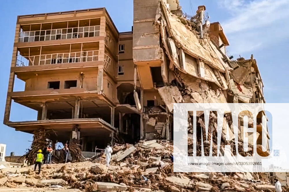 LIBYA, DERNA - SEPTEMBER 23, 2023: Employees of the Lider Centre for Special Risk Rescue Operations of Russia s Emergencies Ministry perform search and rescue operations in dangerous areas of the flood-hit city. Due to heavy rains caused by Storm Daniel flash floods were reported in several cities and towns in eastern Libya, including Al Bayda and Derna. According to the local branch of the Red Crescent, the death toll exceeded 11 thousand, about 20 thousand people are missing. Best quality available. Video screen grab. Russia Emergencies Ministry TASS 62520636