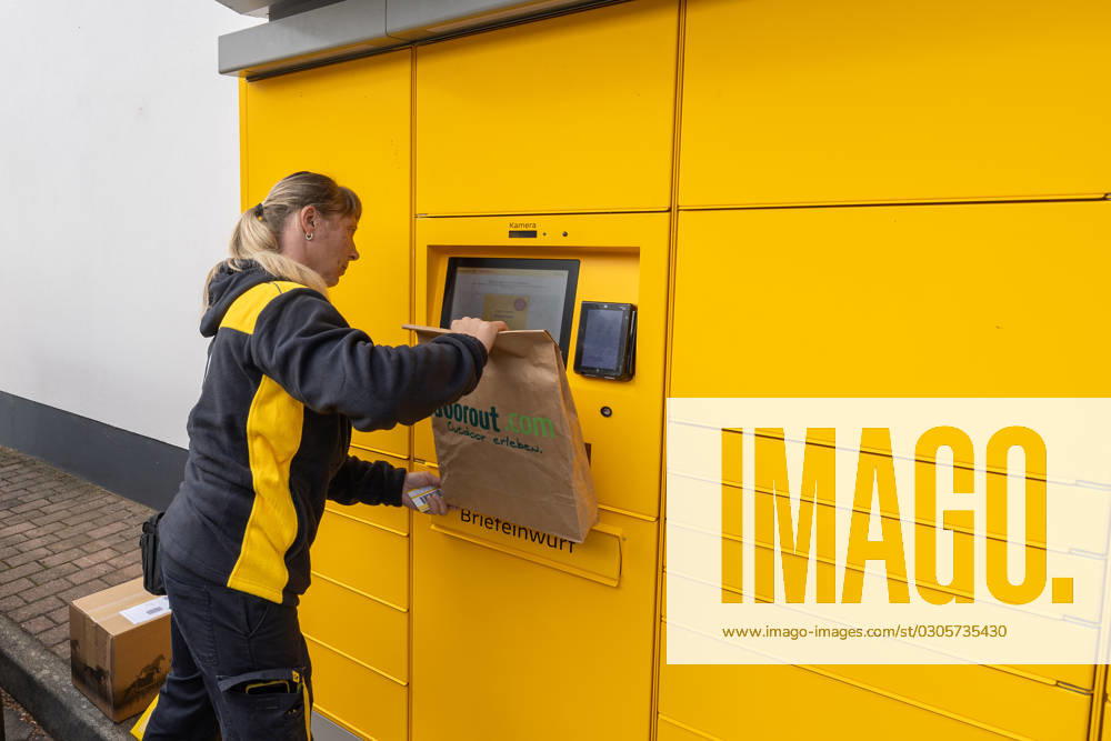 Parcels and letters at the postal station A postwoman scans a parcel Returns items at a postal station in Meissen, Saxony At this location, letters can be posted as well as parcels Meissen Saxony Germany Daniel Schäfer