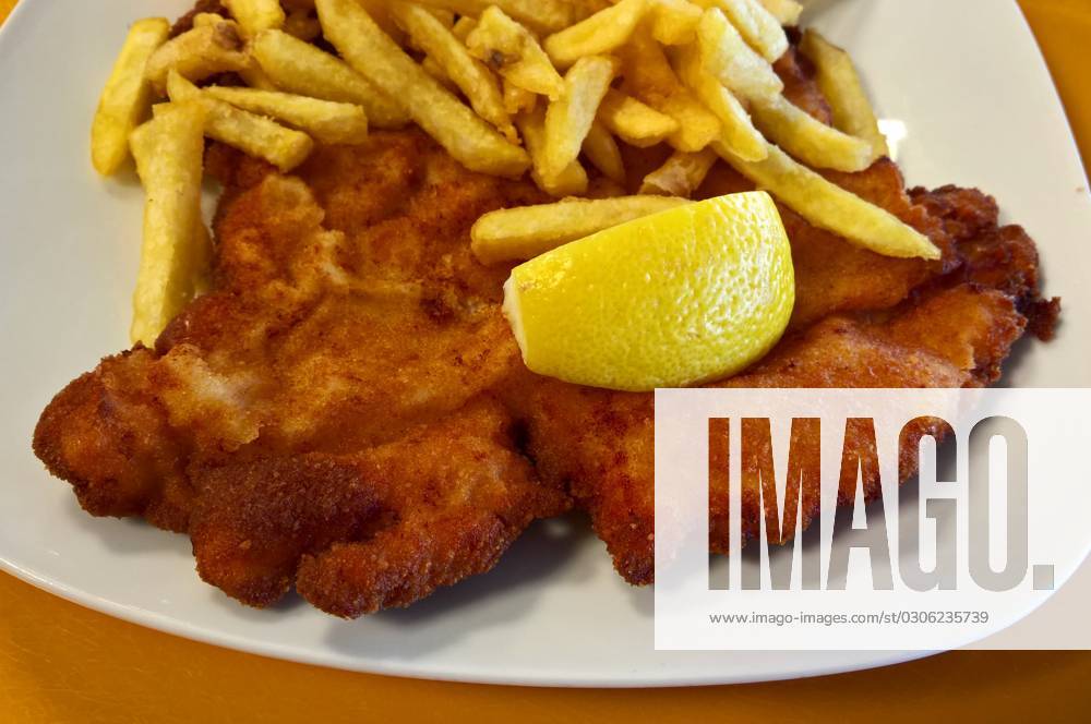 Wiener schnitzel with French fries in the canteen A canteen, or in Switzerland a staff restaurant, is a restaurant within a company or public institution that serves to provide e