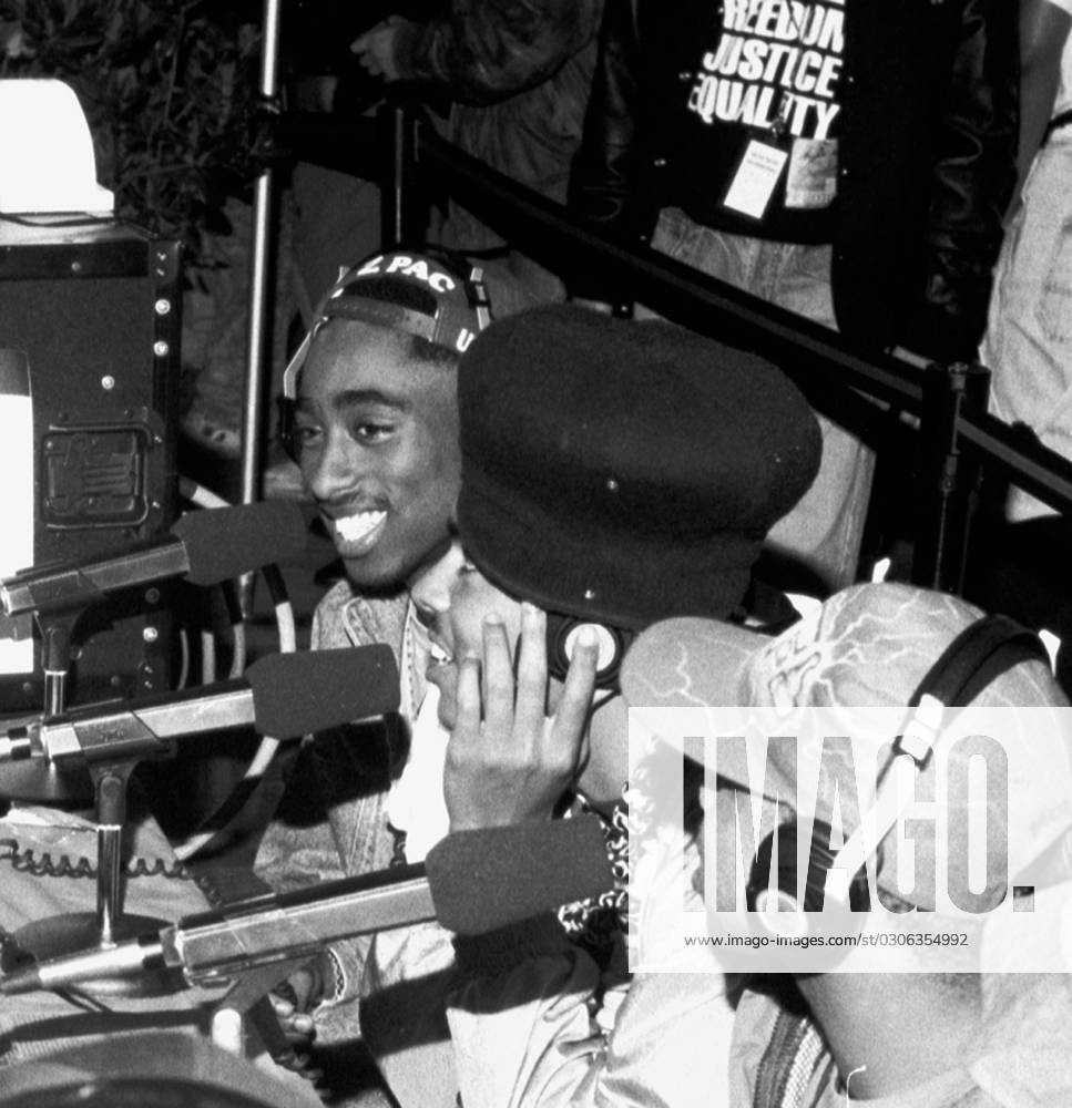 **FILE PHOTO** Man Arrested In Connection with the 1996 Murder Of Tupac Shakur** The Digital Underground (with Tupac Shakur) doing an interview at the KMEL Summer Jam at the Shorline Ampitheatre in Mountain View, CA. August, 1991.