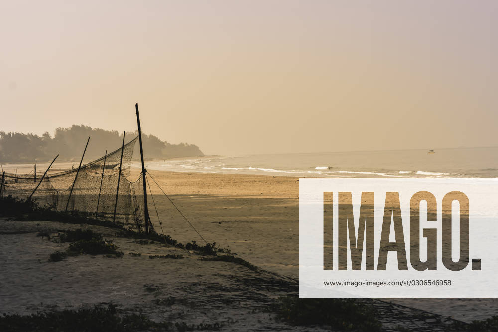 Panorama landscape view of a beautiful tropical sea beach in sunset time during christmas holiday. ( MUMBAI, MAHARASTRA, INDIA). Travel vacation and holiday concept. , 27404348.jpg, silhouette, vacation, sunrise, resort, summer, sun, sky, paradise, palm-tree, travel, coconut, orange, nature, exotic, dusk, trees, yellow, island, ocean, evening, background, light, twilight, sunlight, scenery, tranquil, scene, water, leaf, sundown, golden, caribbean, maldives, tropic, coastal-sand, thailand, holiday, colorful, shore-coast, asia, lagoon, miami, hawaii, islands, bali, morning, lucia, bahamas, jamaica, wave, RECORD DATE NOT STATED