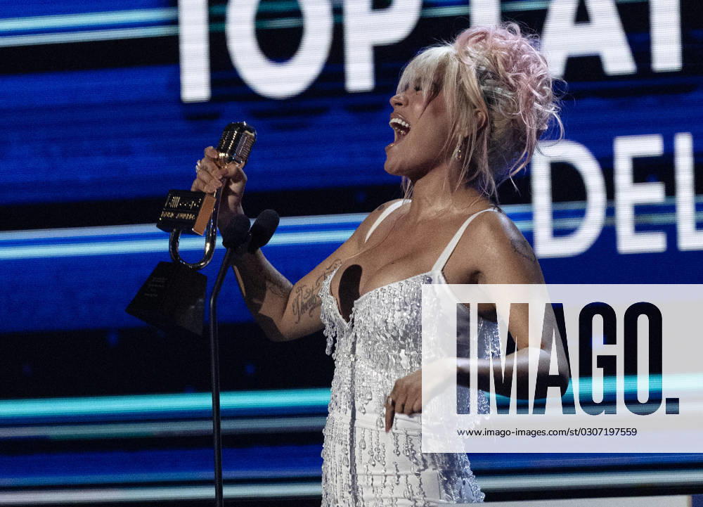 Karol G receives an award at the 2023 Latin Billboard Music Awards at the University of Miami, Watsco Center, Thursday, October 05, 2023 in Coral Gables, Florida. MIA20231005168 GARYxIxROTHSTEIN